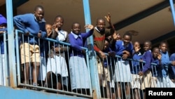 Students are seen outside their classrooms on the second week of a national teachers' strike, at Olympic Primary School in Kenya's capital Nairobi, September 9, 2015.