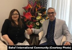 Former Iranian Baha'i community leader Afif Naeimi and his wife, Shohreh, celebrate his release from Tehran's Evin prison, Dec. 20, 2018.