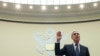 Former special counsel Robert Mueller checks pages in the report as he testifies before the House Judiciary Committee on his report on Russian election interference, Capitol Hill, July 24, 2019 in Washington.