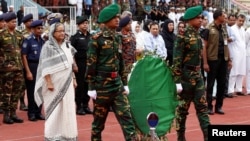 孟加拉国总理哈西娜出席了为死难的20名人质和两位警察举行的悼念仪式（2016年7月4日）