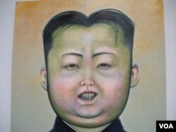 This oil painting of North Korean leader Kim Jong Un was created by Robery Yi, one of 84 students graduating from the Corcoran College of Art and Design.(Photo: VOA/J. Taboh)