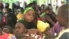 FILE - Children on the streets ask to be spared from the separatist war, in Bamenda, Cameroon, Aug. 31, 2019. Hundreds of children gathered in Yaoundé on June 6, 2022, to protest abuses against children stemming from the separatist conflict. (Moki Edwin Kindzeka/VOA) 