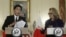 U.S. Secretary of State Hillary Clinton (R) and Japan's Foreign Minister Fumio Kishida hold a joint news conference after their meeting at the State Department in Washington, January 18, 2013.