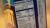 Nutrition facts are seen on a Diamond Food's Pop Secret microwave popcorn box in New York, Nov. 8, 2013.