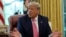 U.S. President Donald Trump speaks about legislation for additional coronavirus aid in the Oval Office at the White House in Washington, July 20, 2020.