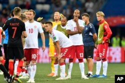 Los jugadores de Dinamarca reaccionan después de perder el partido de la ronda 16 entre Croacia y Dinamarca en la Copa Mundial de fútbol 2018 en el Estadio Nizhny Novgorod, en Nizhny Novgorod, Rusia, el domingo 1 de julio de 2018. (AP Photo / Martin Meissner)
