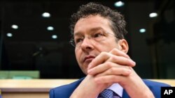 Menteri Keuangan Belanda dan kepala grup euro Jeroen Dijsselbloem di Brussels (24/2). (AP/Geert Vanden Wijngaert)