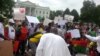Washington-based Burkina Faso citizens and friends of Burkina Faso demonstrate in front of the White House, Sept. 20, 2015.