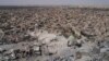 FILE - This aerial view shows the destroyed Grand al-Nuri mosque in the Old City of Mosul, Iraq, June 28, 2017.