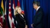 U.S. Secretary of State Hillary Clinton, left, speaks with ASEAN Secretary General Surin Pitsuwan, Jakarta, Sept. 4, 2012.