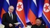 Президент России Владимир Путин и лидер Северной Кореи Ким Чен Ын на государственном приеме в Пхеньяне, 19 июня 2024 года.