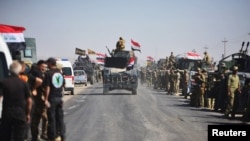 16일 이라크 정부 군이 키크루크 지역에서 진군하고 있다.