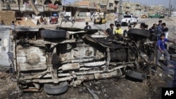 29일 이라크 바그다드에서 벌어진 연쇄 폭탄 공격 현장.