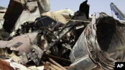 The wreckage of the Dana Air plane crash in Lagos, Nigeria, June 6, 2012.