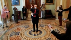 U.S. Senate Minority Leader Chuck Schumer (D-NY) talks to reporters inside the U.S. Capitol as senators returned to Capitol Hill amid concerns that their legislative sessions could put lawmakers and staff at risk of contracting the coronavirus in Washingt