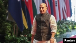 FILE - India's Defense Minister Rajnath Singh arrives for an ASEAN Defense Ministers Meeting - Plus in Jakarta, Nov. 16, 2023. India has sought to counter China as Beijing grows its influence in India's neighborhood through investments and development projects.