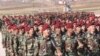 A group of Arab soldiers who have joined Kurdish peshmerga forces take part in their graduation ceremony at a training camp in Duhok province, Iraq, Feb. 7, 2017.