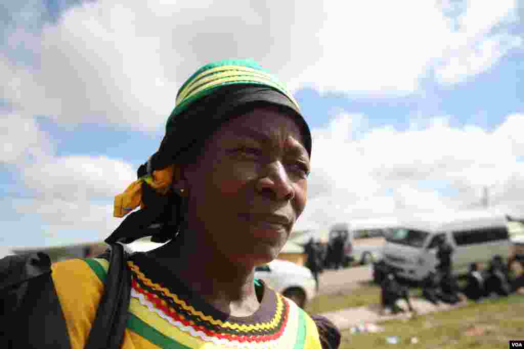 Pumane Ngocwane travelled for 12 hours to get to Qunu, South Africa and made a dress for Mandela&#39;s funeral as she wanted to be on his soil as he was lowered into his grave, Dec. 15, 2013. Hannah McNeish for VOA.