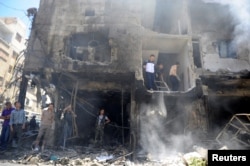 叙利亚大马士革郊区的自杀式汽车爆炸现场