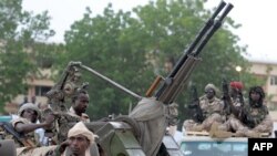 (FILES) A picture taken on June 21, 2008 shows Chadian soldiers parading in N'djamena.Rebels waging an offensive in the Central African Republic seized Kaga-Bandoro, another major town, on Dec. 25, 2012.