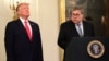 FILE - U.S. President Donald Trump and Attorney General William Barr participate in a ceremony in the East Room of the White House in Washington, Sept. 9, 2019.
