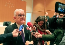 National Financial Prosecutor Jean Francois Bohnert speaks to the media at a Paris courthouse, Jan. 31, 2020.