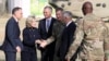 U.S. Defense Secretary James Mattis, second from right, and NATO Secretary General Jens Stoltenberg, center, are welcomed by U.S. General John Nicholson after arriving at Resolute Support Mission headquarters in Kabul, Afghanistan, Sept. 27, 2017. 