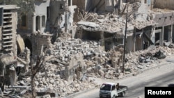 Birnin Aleppo da yake shan lugudan wuta daga mayakan saman Rasha da Siriya