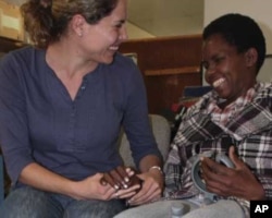 Grobicki and a ‘hopeful’ Ndabazonke share a joke in the physiotherapist’s consulting room