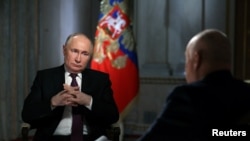 3月12日，普京在莫斯科接受采访。
