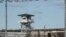 In this April 16, 2018, file photo, a guard tower stands above the Lee Correctional Institution, a maximum security prison in Bishopville, South Carolina.