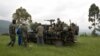 Congolese government soldiers prepare to drive from a military outpost between Kachiru village and Mbuzi hill, in eastern Democratic Republic of the Congo, May 25, 2012.