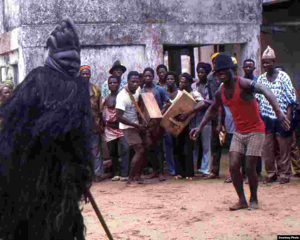 This friendly devil danced in celebration of a local tribal chief’s birthday. (Submitted by George Bergeman)