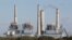 FILE- The Fayette Power Project, a coal-fired power plant, is shown in Ellinger, Texas, Dec. 15, 2010. Some environmentalists, ranchers and scientists linked tree deaths in the area to sulfur dioxide emissions from the plant.