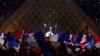 French President-elect Emmanuel Macron celebrates on the stage at his victory rally near the Louvre in Paris, France May 7, 2017. 