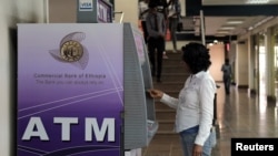 Faayilii - Maashinii ATM 