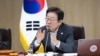 资料照片：韩国总统李在明2025年7月29日在国务会议上讲话。