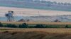 Turkish army tanks hold positions near the border with Syria, in the outskirts of the village of Elbeyi, east of the town of Kilis, in southeaster Turkey, July 23, 2015. 
