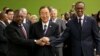 United Nations Secretary-General Ban Ki-moon, center, joins hands with President of the Democratic Congo Joseph Kabila Kabange, left, and President of Rwanda Paul Kagame at the 67th session of the General Assembly at UN Headquarters, Sept. 27, 2012.