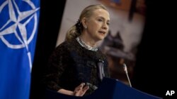 U.S. Secretary of State Hillary Clinton speaks at a news conference after a meeting of NATO foreign ministers in Brussels, Dec. 5, 2012