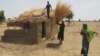 Nigerians of Cameroonian origin build a house in a village of Tallamallabrahim, northern Cameroon where they settled after fleeing Nigeria to escape massacres by the Islamic group Boko Haram, May 27, 2013.