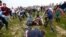 Players fight for the bottle during the bottle-kicking game in Hallaton, central England, April 1, 2013.