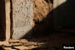 کنده‌کاری خط میخی بر روی یکی از دیوارهای شهر باستانی نینوا به چشم می‌خورد - ۲۸ مه ۲۰۲۲