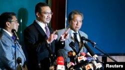 马来西亚代理交通部长希山慕丁在3月18日的记者会上