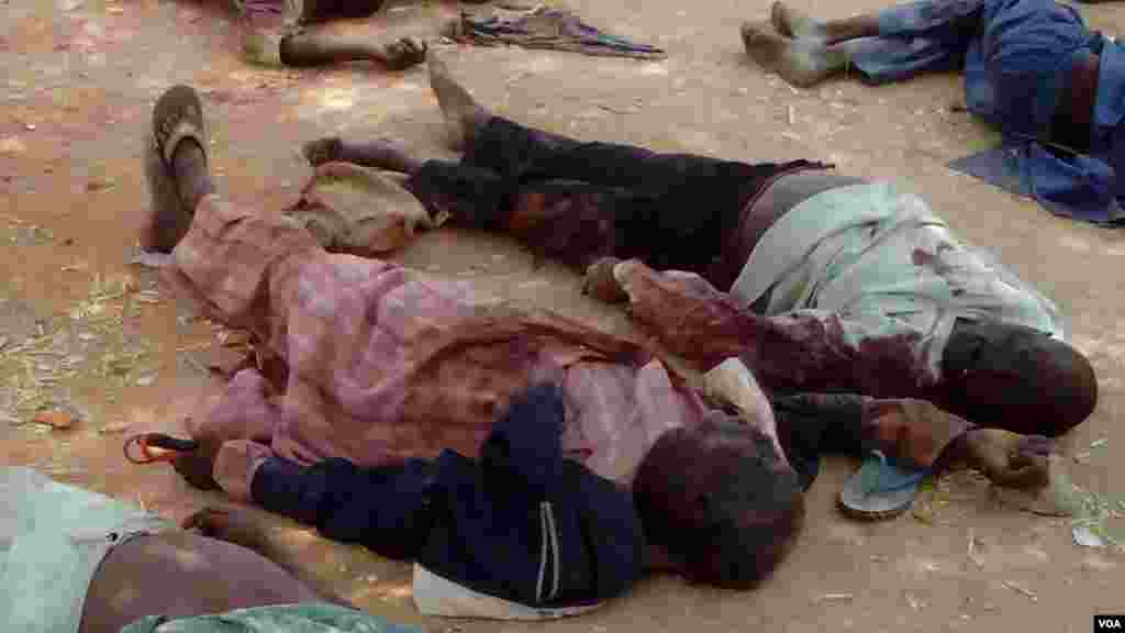 The first customers, most of them pensioners, stand in a queue to enter a branch at National Bank of Greece headquarters in Athens, July 20, 2015.