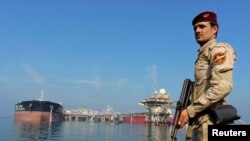 President Barack Obama is celebrating Earth Day with a visit to the Everglades to talk about how global warming threatens the U.S. economy. In this photo, military personnel salute as Air Force One departs with the president aboard from Andrews Air Force Base, Maryland on its way to the Everglades, April 22, 2015.