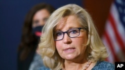 FILE - Rep. Liz Cheney, R-Wyo., the House Republican Conference chair, speaks with reporters following a GOP strategy session on Capitol Hill in Washington, April 20, 2021.