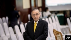 Philippines Foreign Affaires Secretary Teodoro Locsin Jr. walks ahead of the Special Meeting of Foreign ministers of The Association of Southeast Asian Nations (ASEAN) coordination council in Vientiane, Laos, Thursday, Feb. 20, 2020. (AP Photo…