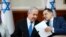 Israeli Prime Minister Benjamin Netanyahu, left, and Cabinet Secretary Tzahi Braverman attend the weekly Cabinet meeting at his office in Jerusalem, Dec. 1, 2019. 