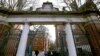 FILE - A gate opens to the Harvard University campus in Cambridge, Mass., Dec. 13, 2018.